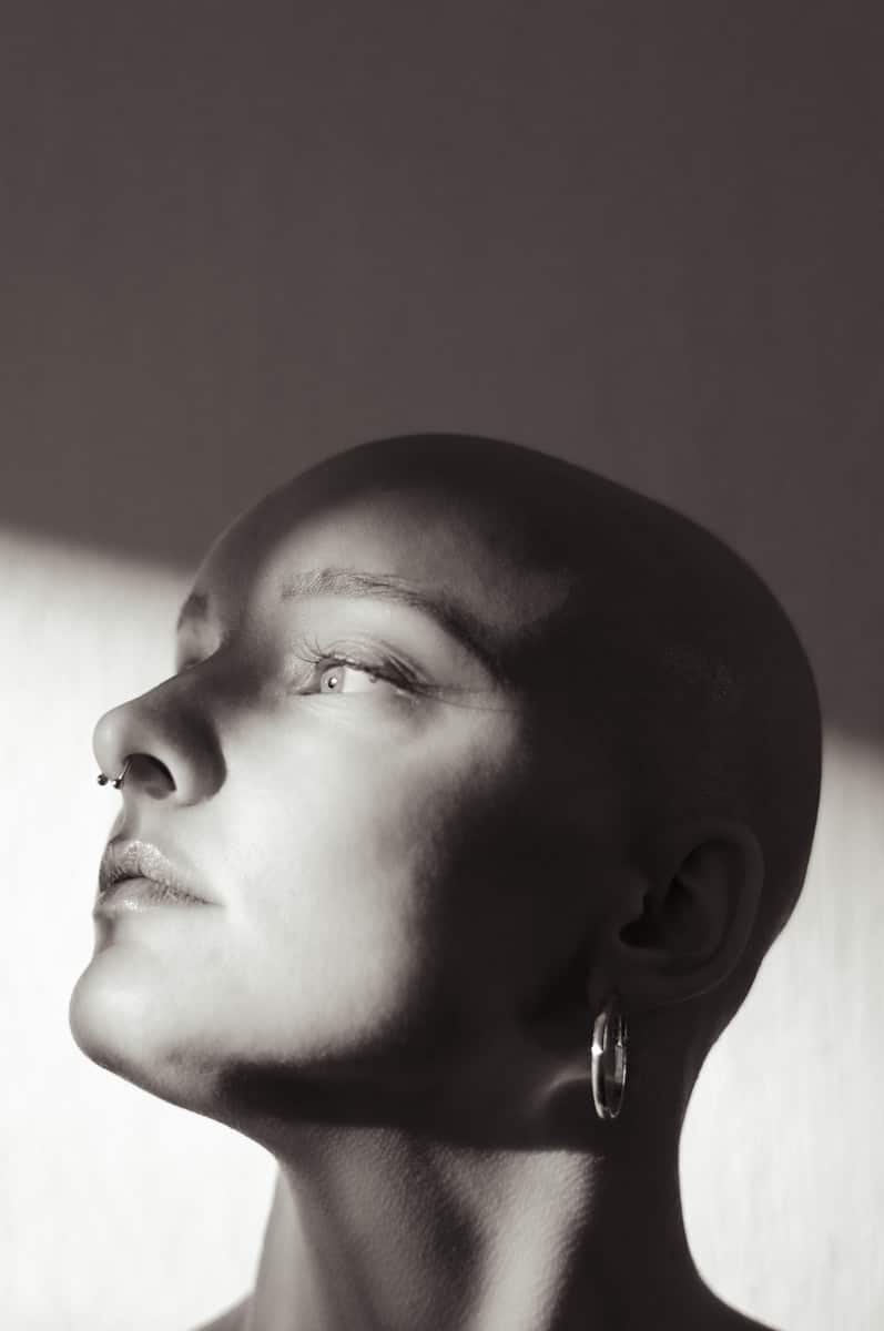 a black and white photo of a woman's head